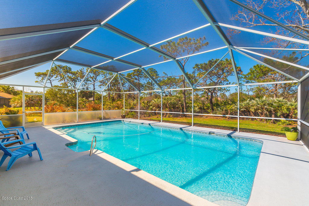 3956 Sparrow Hawk Road Melbourne, FL 32934 - Photo 30 of 34 an outdoor view with a swimming pool