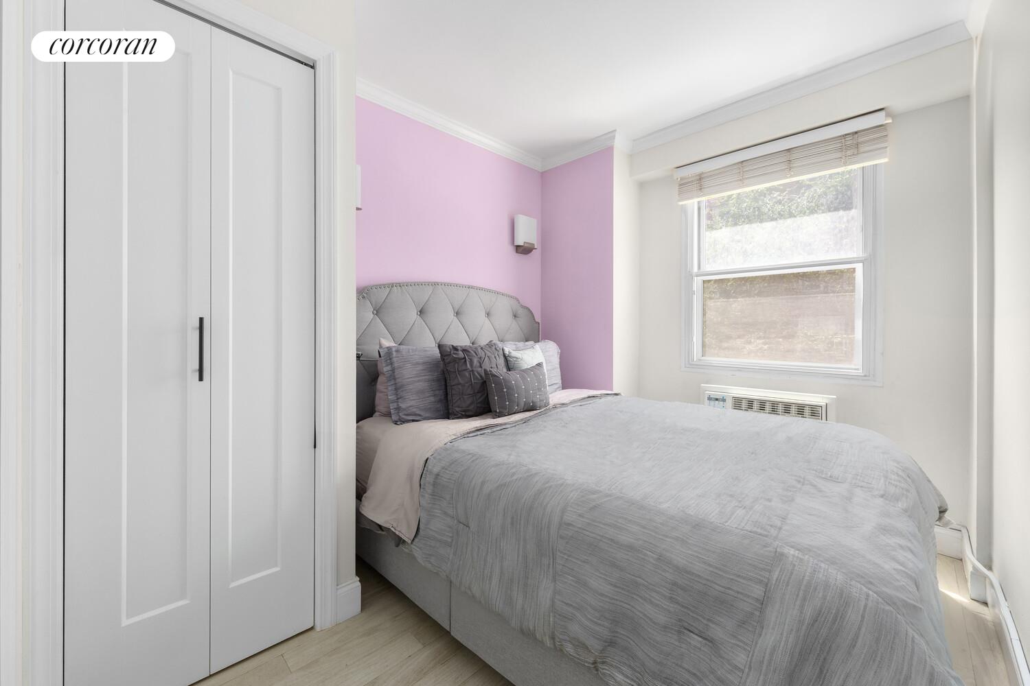 79 West 12th Street, Unit 3B Manhattan, NY 10011 - Photo 4 of 8 a bedroom with a bed and a window