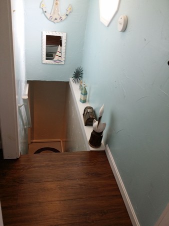 5 Thompson Road, Unit A Bourne, MA 02532 - Photo 10 of 13 a view of an entryway with wooden floor