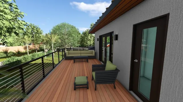 a view of a balcony with chairs and wooden floor