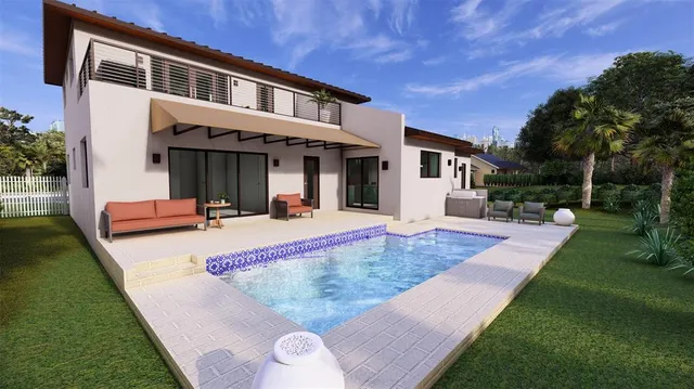 a view of a house with a yard porch and sitting area