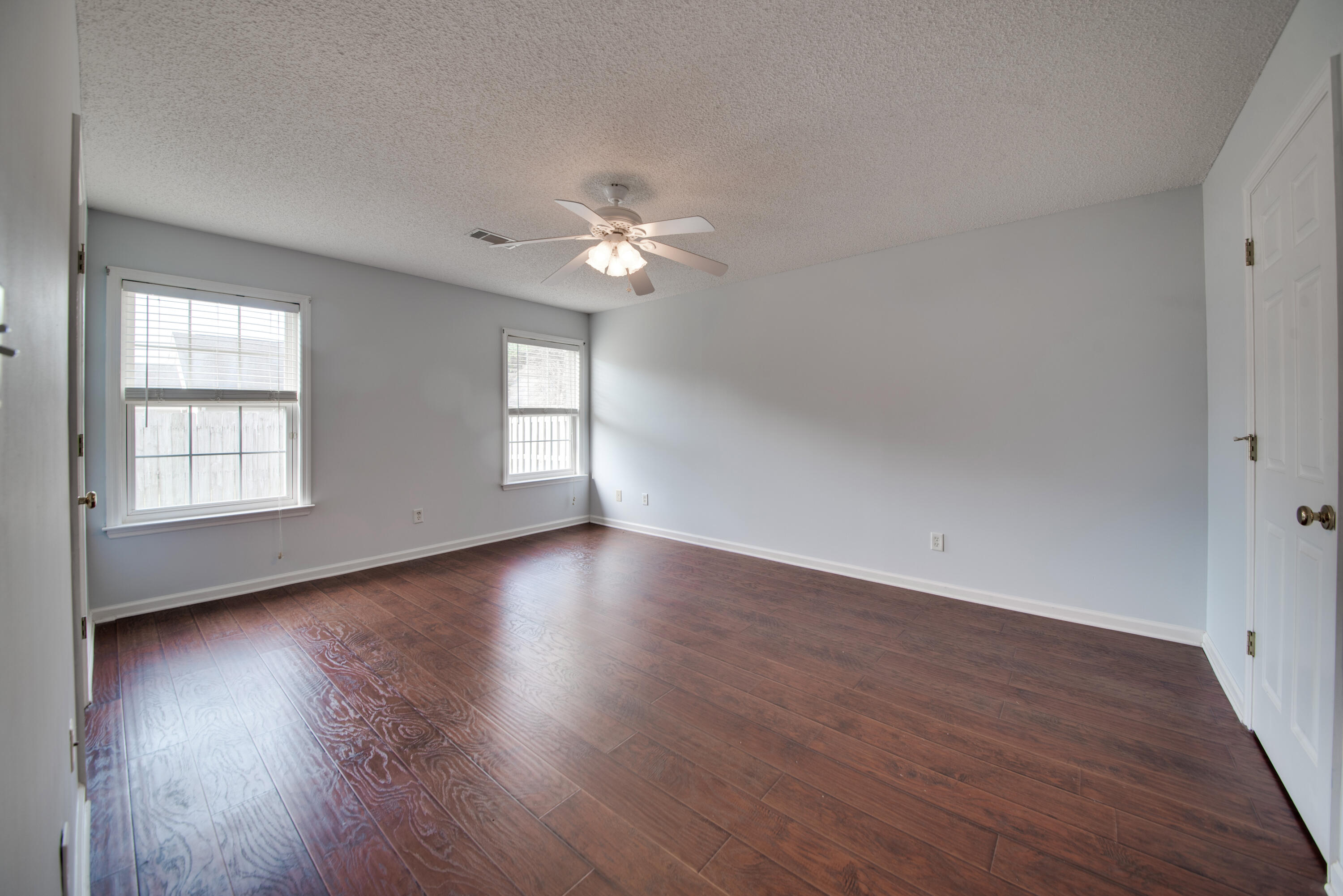 8 Chappells Road Aiken, SC 29803 - Photo 6 of 15 wooden floor in an empty room with a window