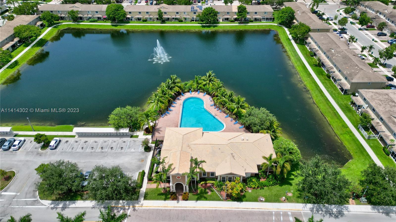 5894 Abbey Road Tamarac, FL 33321 - Photo 5 of 48 an aerial view of a house with a lake view