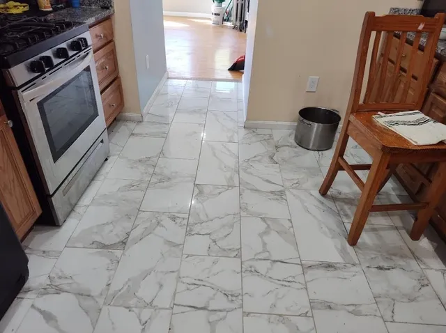 a view of a kitchen with appliances and cabinets