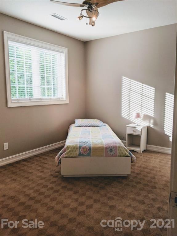 259 Beechtree Circle Rutherfordton, NC 28139 - Photo 17 of 48 a bedroom with a bed and window