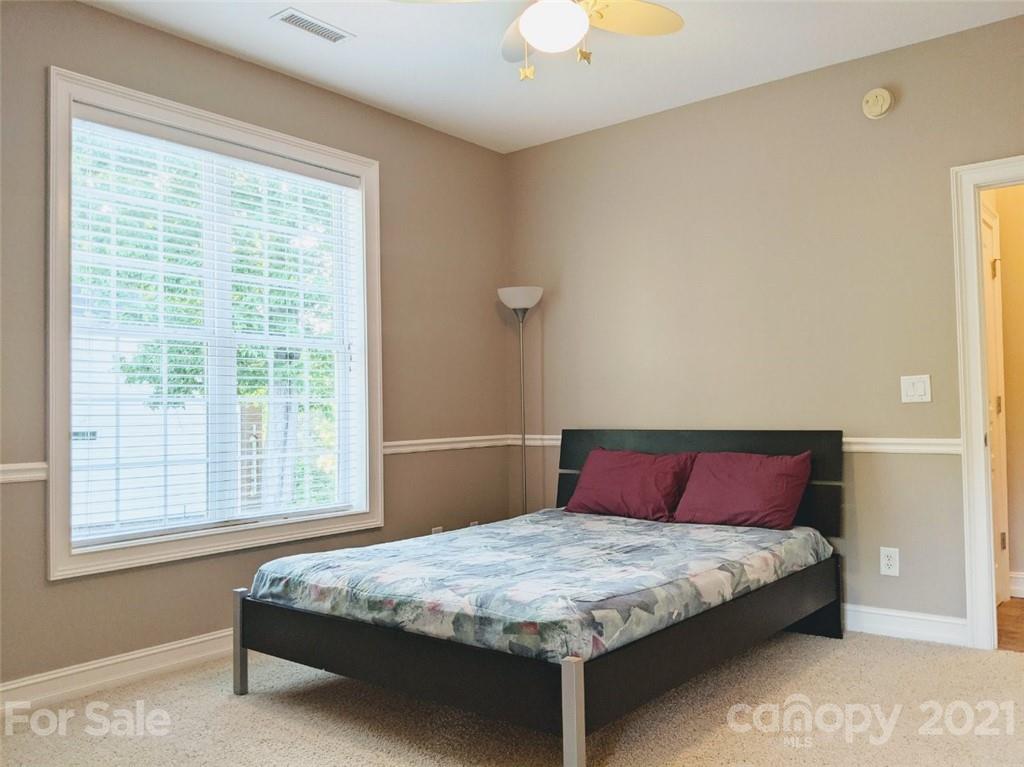 259 Beechtree Circle Rutherfordton, NC 28139 - Photo 18 of 48 a bedroom with a bed and with windows