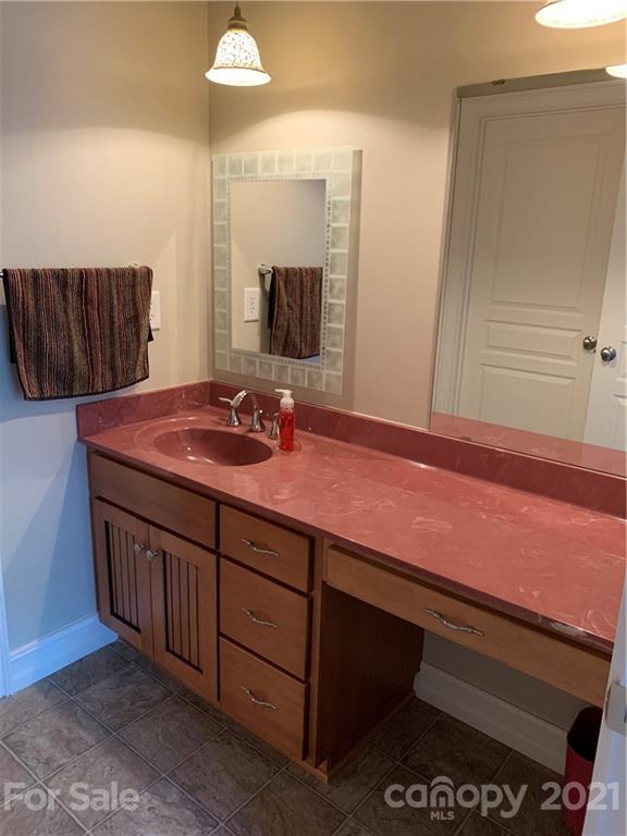 259 Beechtree Circle Rutherfordton, NC 28139 - Photo 23 of 48 a bathroom with a sink and a mirror