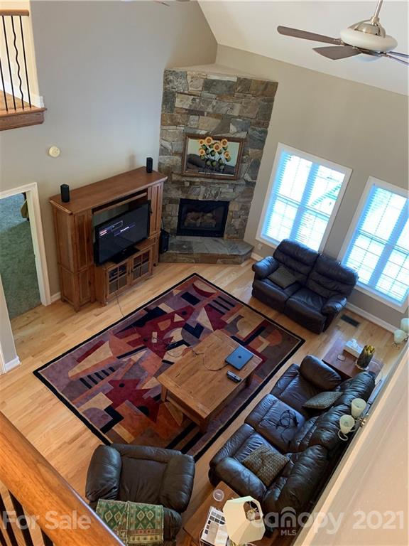 259 Beechtree Circle Rutherfordton, NC 28139 - Photo 26 of 48 a living room with furniture and a fireplace
