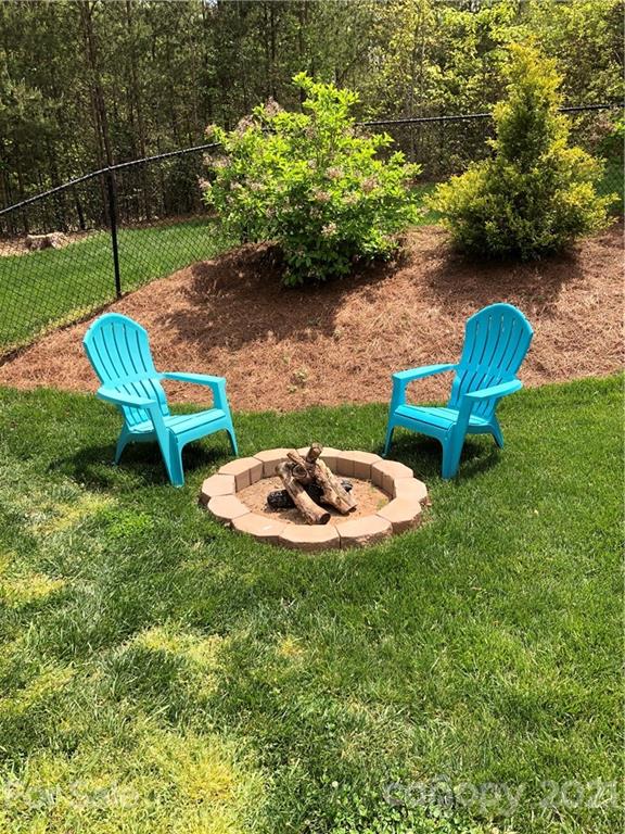 259 Beechtree Circle Rutherfordton, NC 28139 - Photo 44 of 48 a view of a backyard with plants and outdoor seating