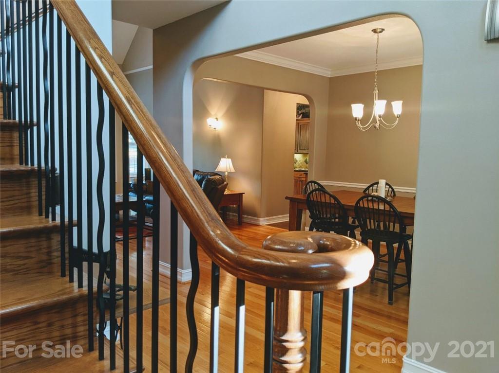 259 Beechtree Circle Rutherfordton, NC 28139 - Photo 6 of 48 a dining room with furniture and a chandelier