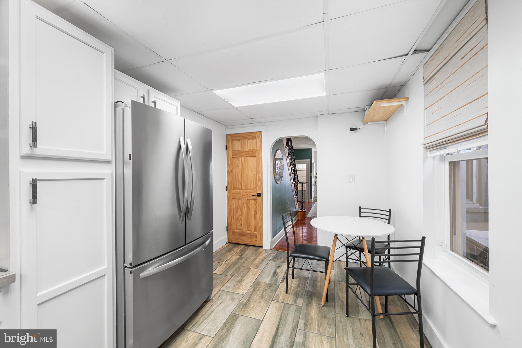 2425 Sepviva Street Philadelphia, PA 19125 - Photo 13 of 34 a kitchen with stainless steel appliances a refrigerator and microwave