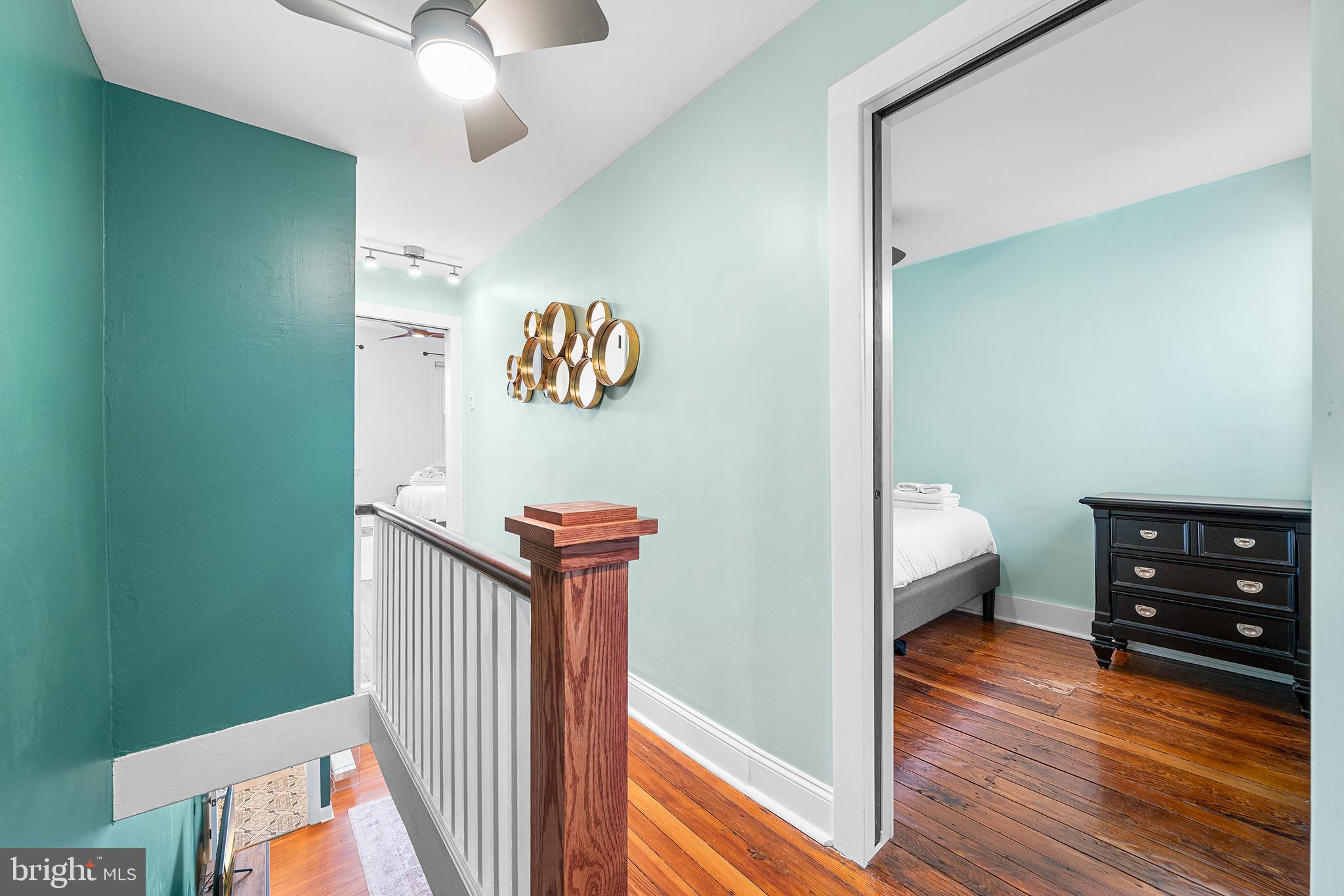2425 Sepviva Street Philadelphia, PA 19125 - Photo 17 of 34 a view of a hallway view with wooden floor and staircase