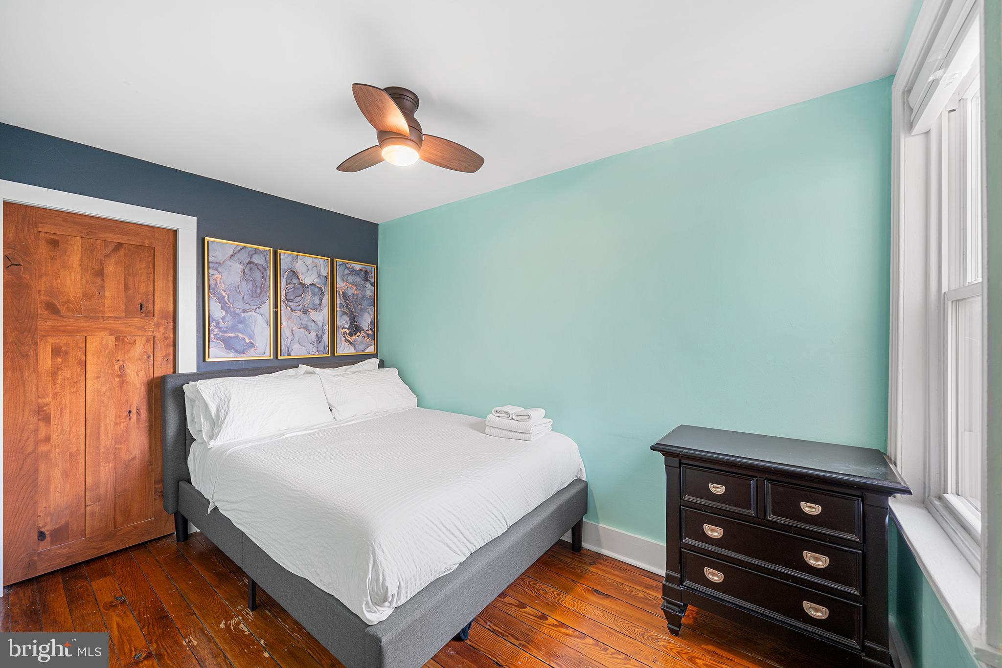 2425 Sepviva Street Philadelphia, PA 19125 - Photo 26 of 34 a bedroom with a bed and a window