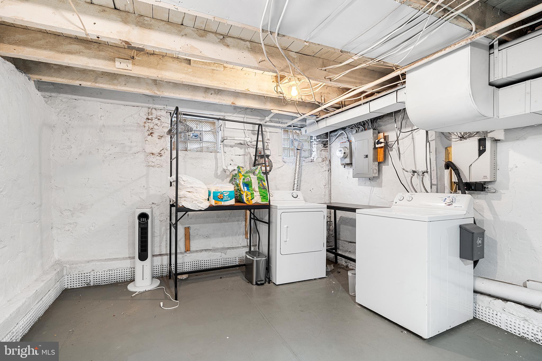 2425 Sepviva Street Philadelphia, PA 19125 - Photo 27 of 34 a utility room with dryer and washer