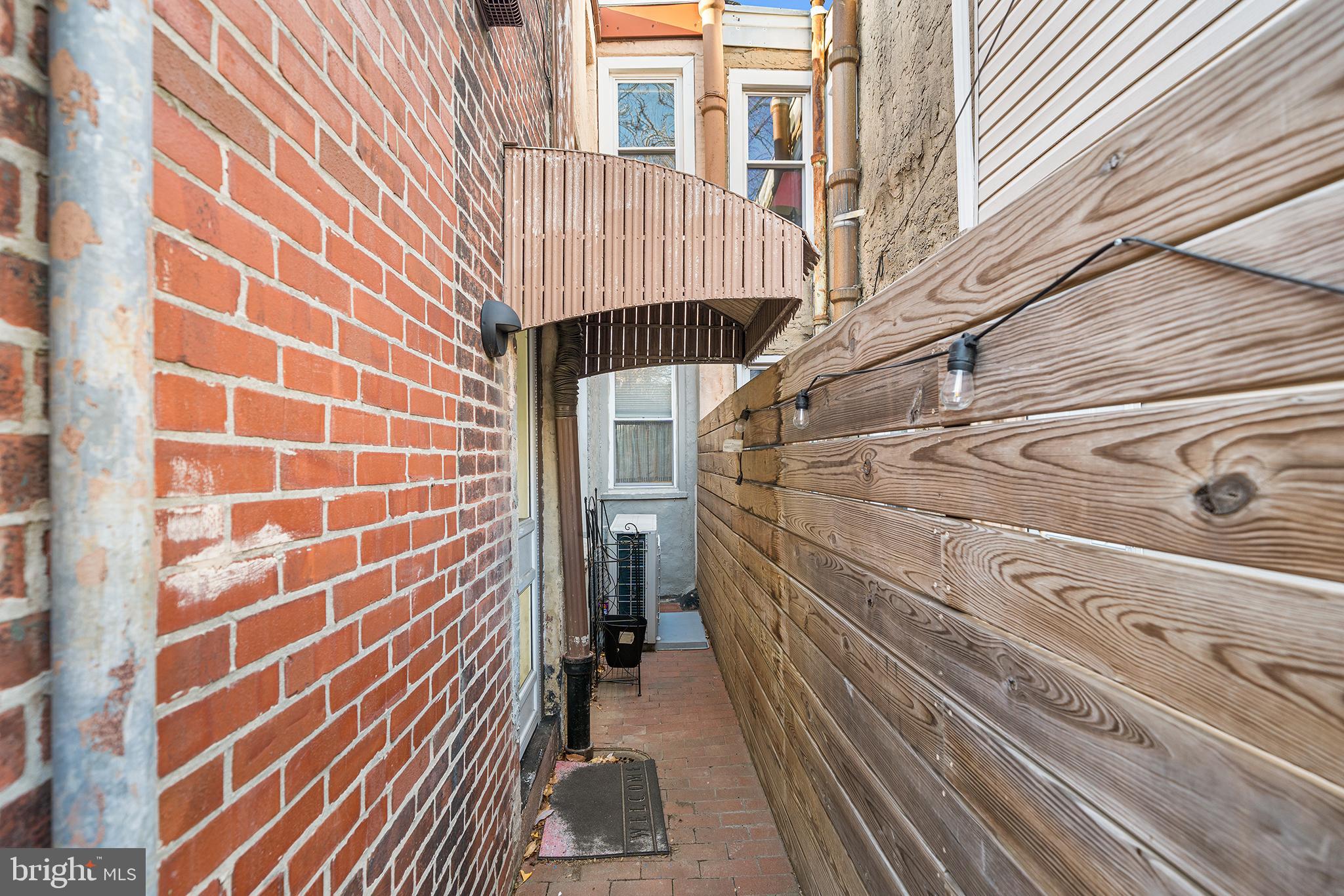 2425 Sepviva Street Philadelphia, PA 19125 - Photo 28 of 34 a view of a pathway both side of building