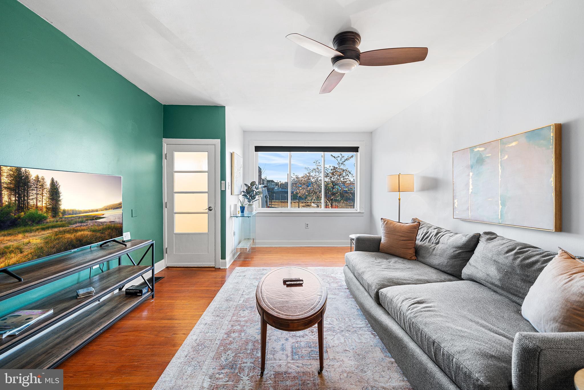 2425 Sepviva Street Philadelphia, PA 19125 - Photo 7 of 34 a living room with furniture and a flat screen tv