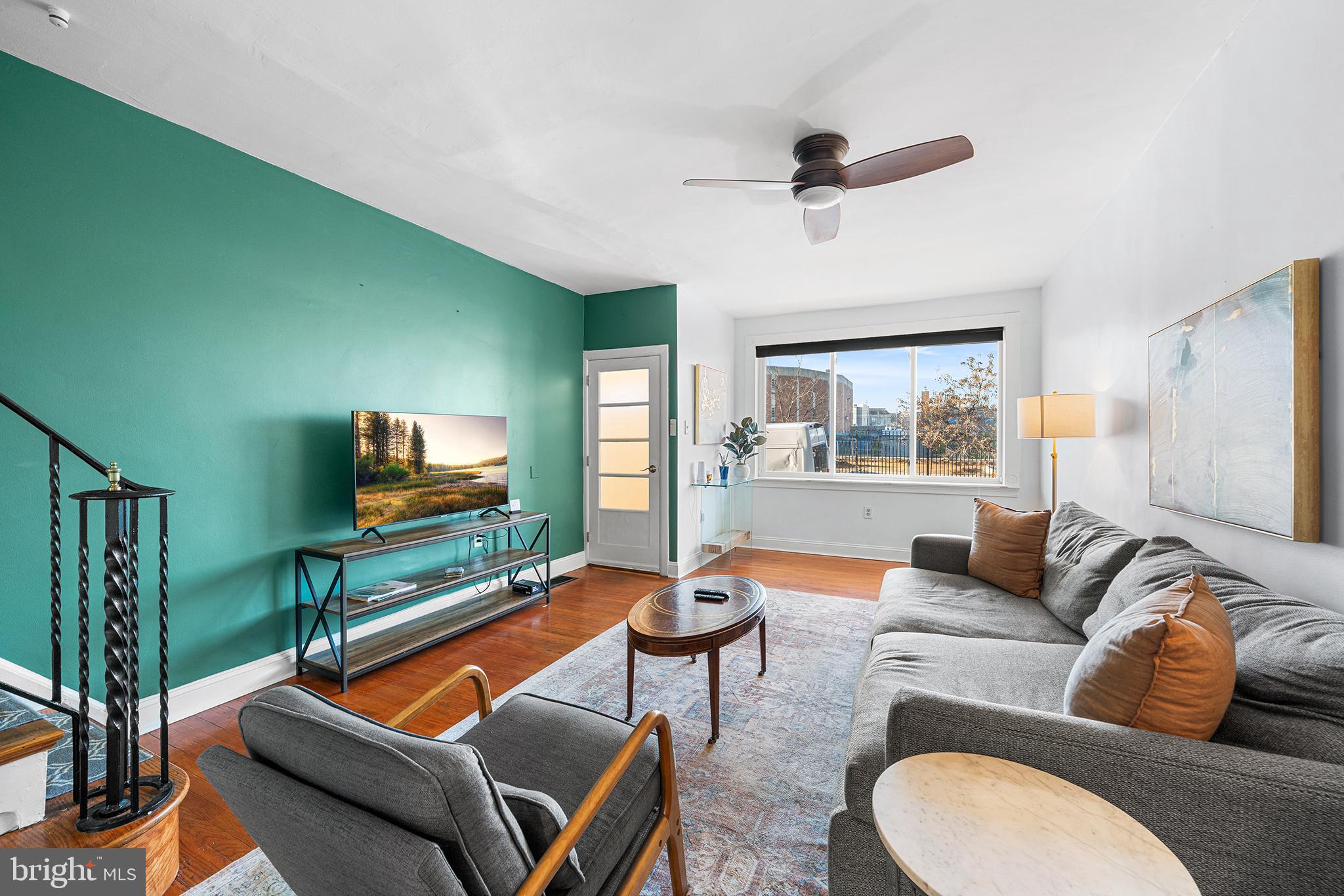 2425 Sepviva Street Philadelphia, PA 19125 - Photo 8 of 34 a living room with furniture and a flat screen tv