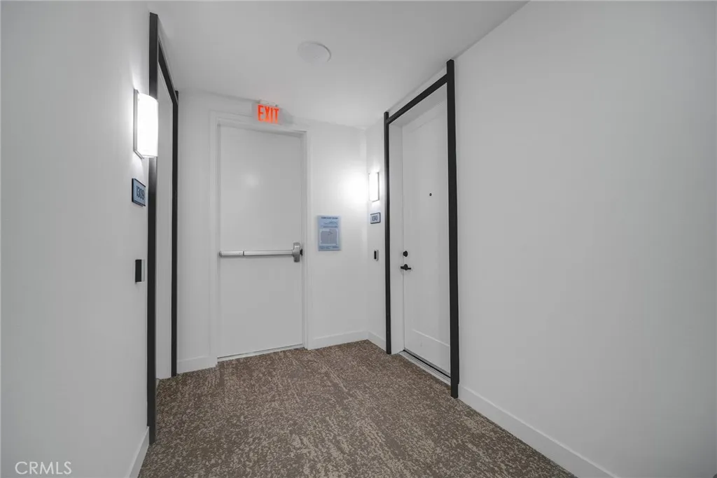 1310 Rivington Irvine, CA 92606 - Photo 17 of 20 a view of hallway with a mirror