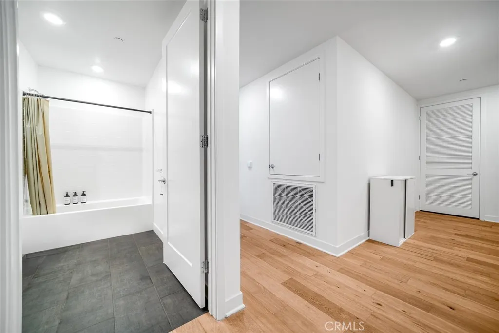 1310 Rivington Irvine, CA 92606 - Photo 3 of 20 an empty room with wooden floor and windows