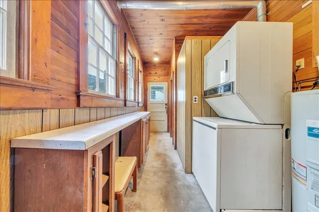 a bathroom with a toilet sink and shower
