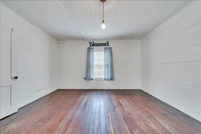 a bathroom with a bathtub and sink