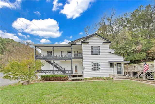 a view of balcony with wooden floor