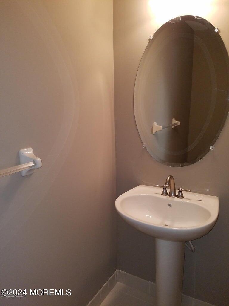 150 Brookfield Drive Jackson, NJ 08527 - Photo 17 of 41 a bathroom with a sink and mirror