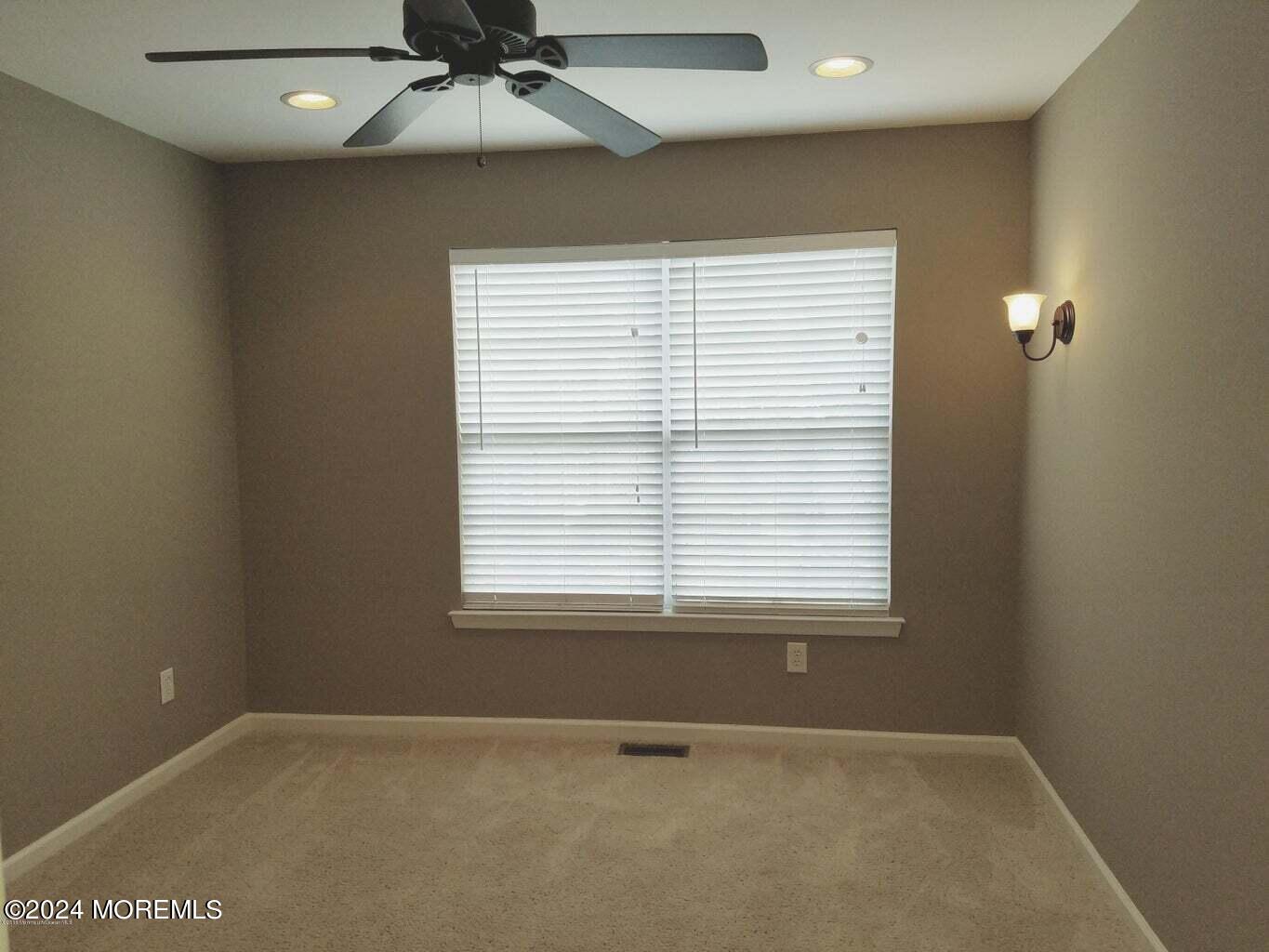 150 Brookfield Drive Jackson, NJ 08527 - Photo 23 of 41 a view of an empty room with a window