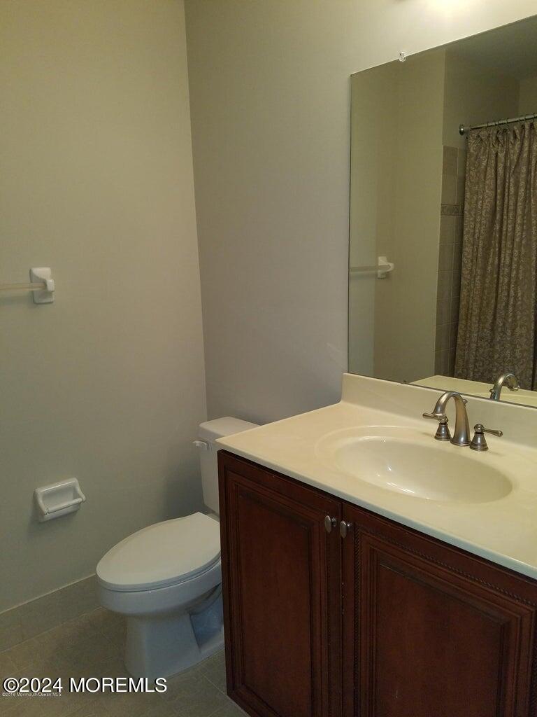 150 Brookfield Drive Jackson, NJ 08527 - Photo 25 of 41 a bathroom with a sink a toilet and mirror
