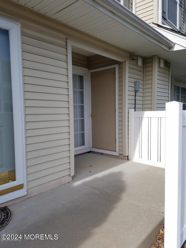 150 Brookfield Drive Jackson, NJ 08527 - Photo 38 of 41 a view of a house with a door and wooden walls