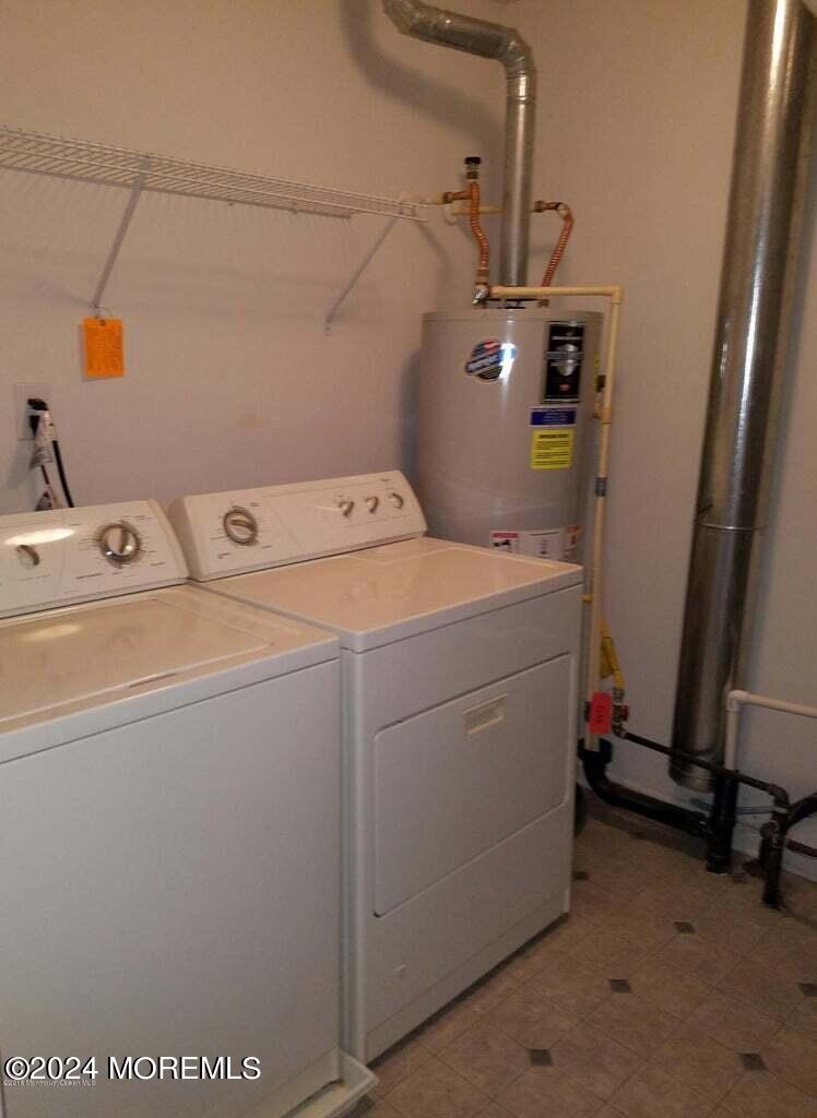 150 Brookfield Drive Jackson, NJ 08527 - Photo 40 of 41 a utility room with dryer and washer