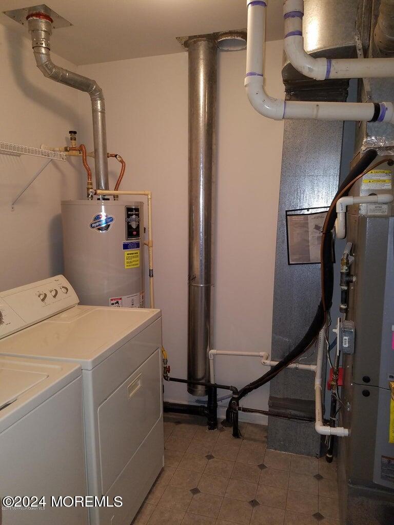 150 Brookfield Drive Jackson, NJ 08527 - Photo 41 of 41 a utility room with dryer and washer