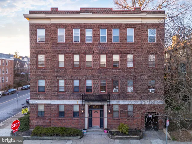 an aerial view of a city with lots of residential buildings