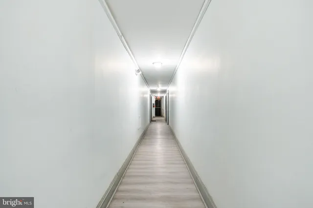 a aerial view of a house with a large pool