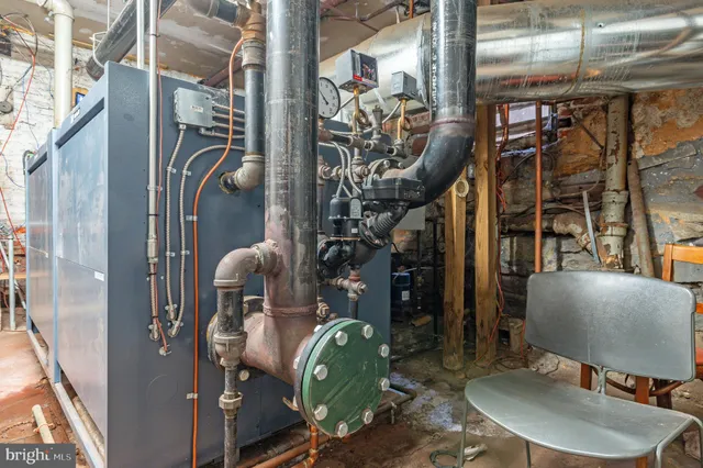 a bathroom with a sink a mirror and shower