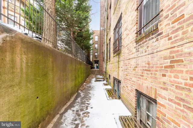 a kitchen with a stove and a sink