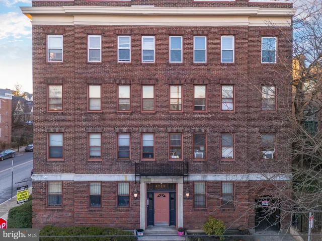 a blue building with a outdoor space