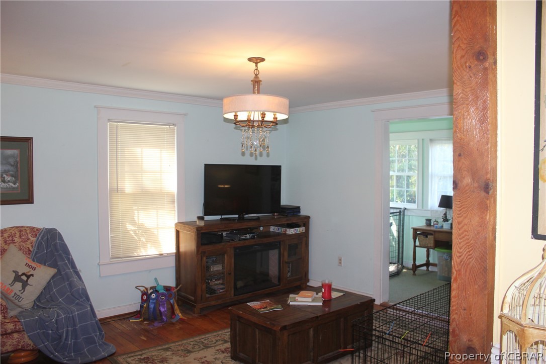 1195 Buckley Hall Road Dutton, VA 23050 - Photo 36 of 47 a living room with furniture and a flat screen tv