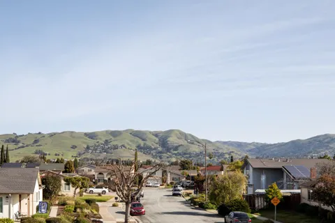 a view of a city with mountain
