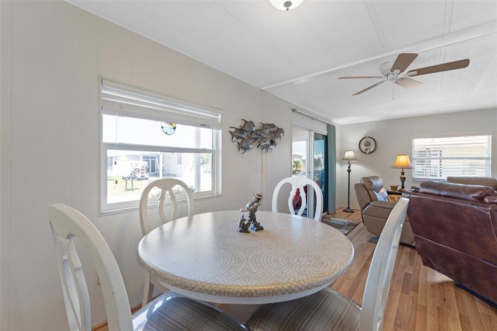 175 Martinique Road North Port, FL 34287 - Photo 16 of 82 a dining room with furniture and window