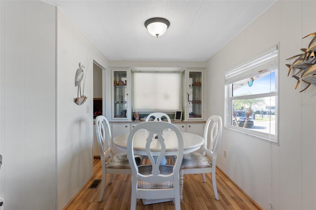 175 Martinique Road North Port, FL 34287 - Photo 17 of 82 a view of a dining room with furniture and a window