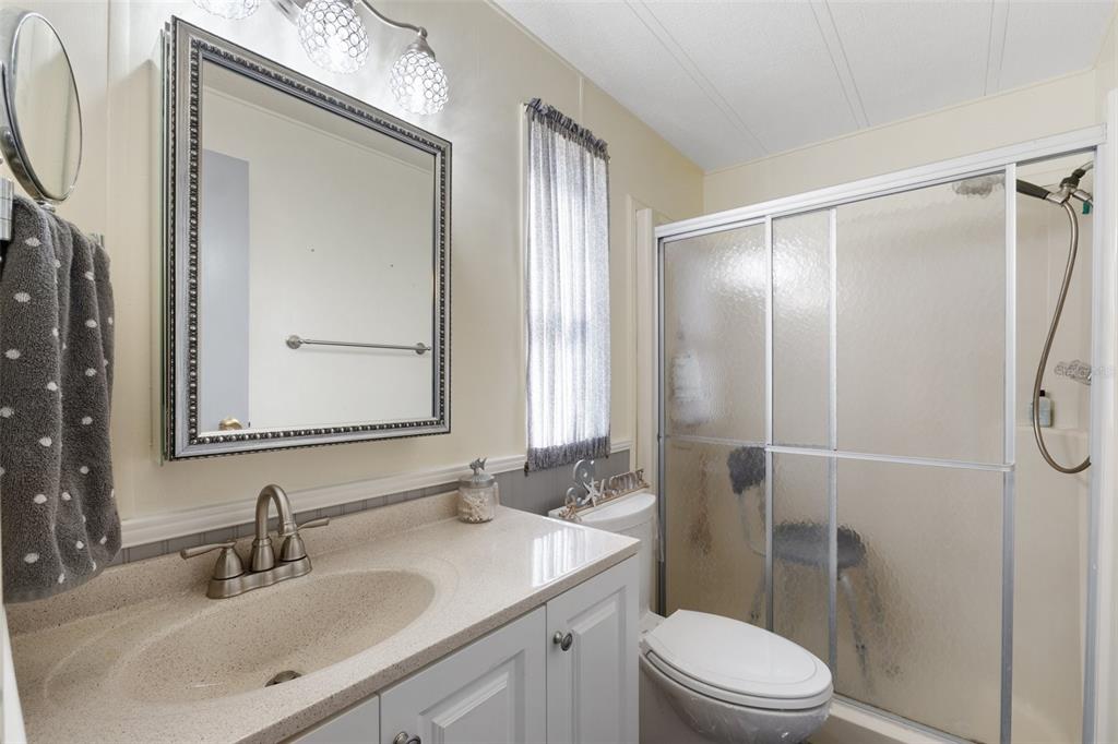 175 Martinique Road North Port, FL 34287 - Photo 36 of 82 a bathroom with a sink a toilet and shower