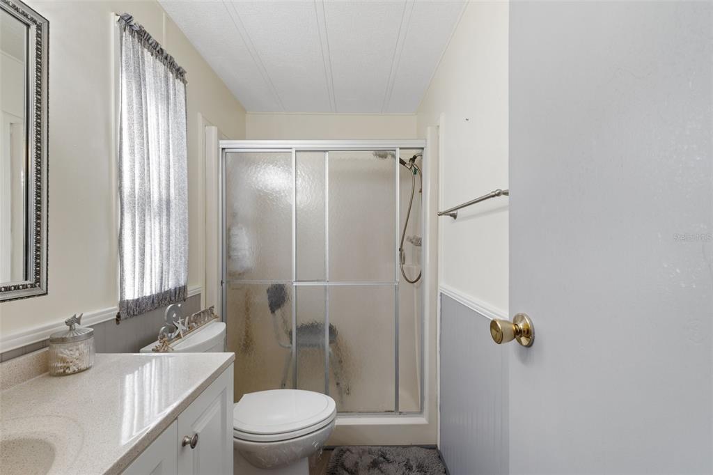 175 Martinique Road North Port, FL 34287 - Photo 37 of 82 a bathroom with a sink a toilet and shower