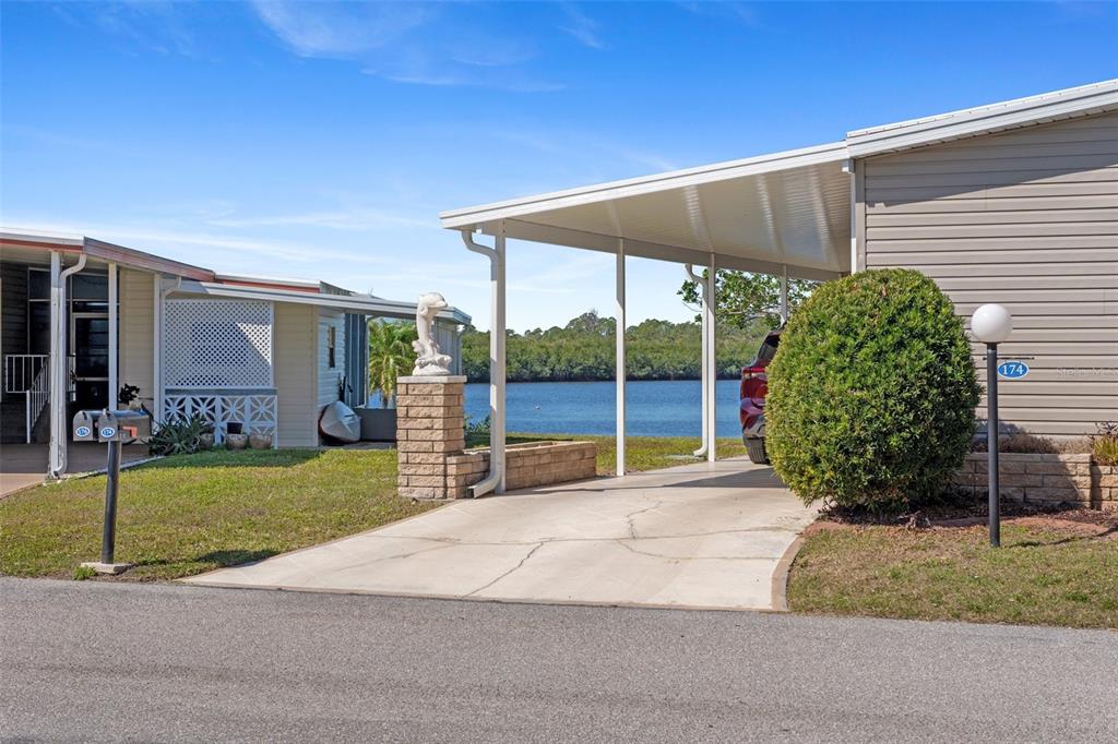 175 Martinique Road North Port, FL 34287 - Photo 38 of 82 a view of a house with backyard and porch