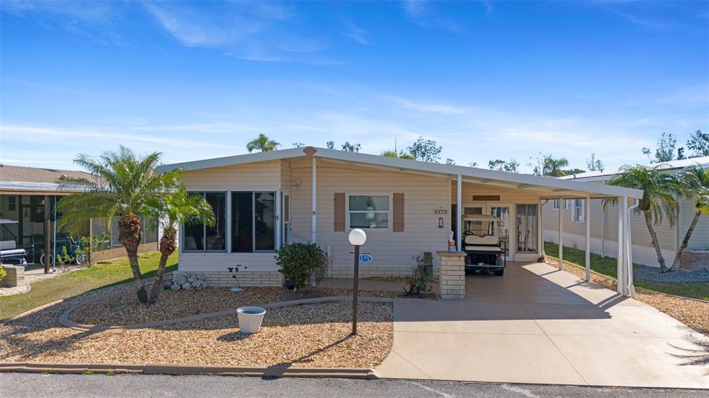 175 Martinique Road North Port, FL 34287 - Photo 6 of 82 a front view of a house with garden
