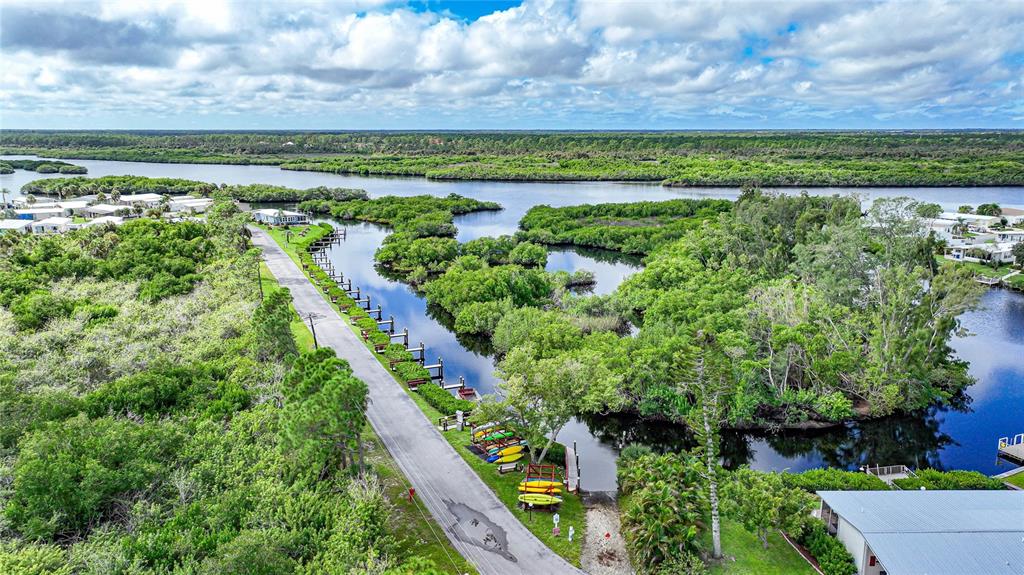 175 Martinique Road North Port, FL 34287 - Photo 63 of 82 a view of a garden with an outdoor seating