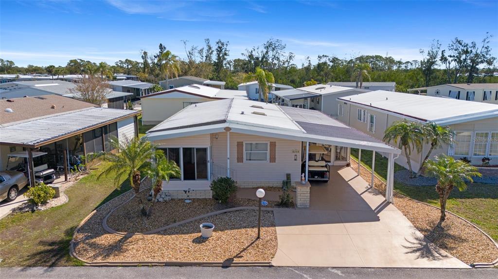 175 Martinique Road North Port, FL 34287 - Photo 8 of 82 a front view of a house with a yard