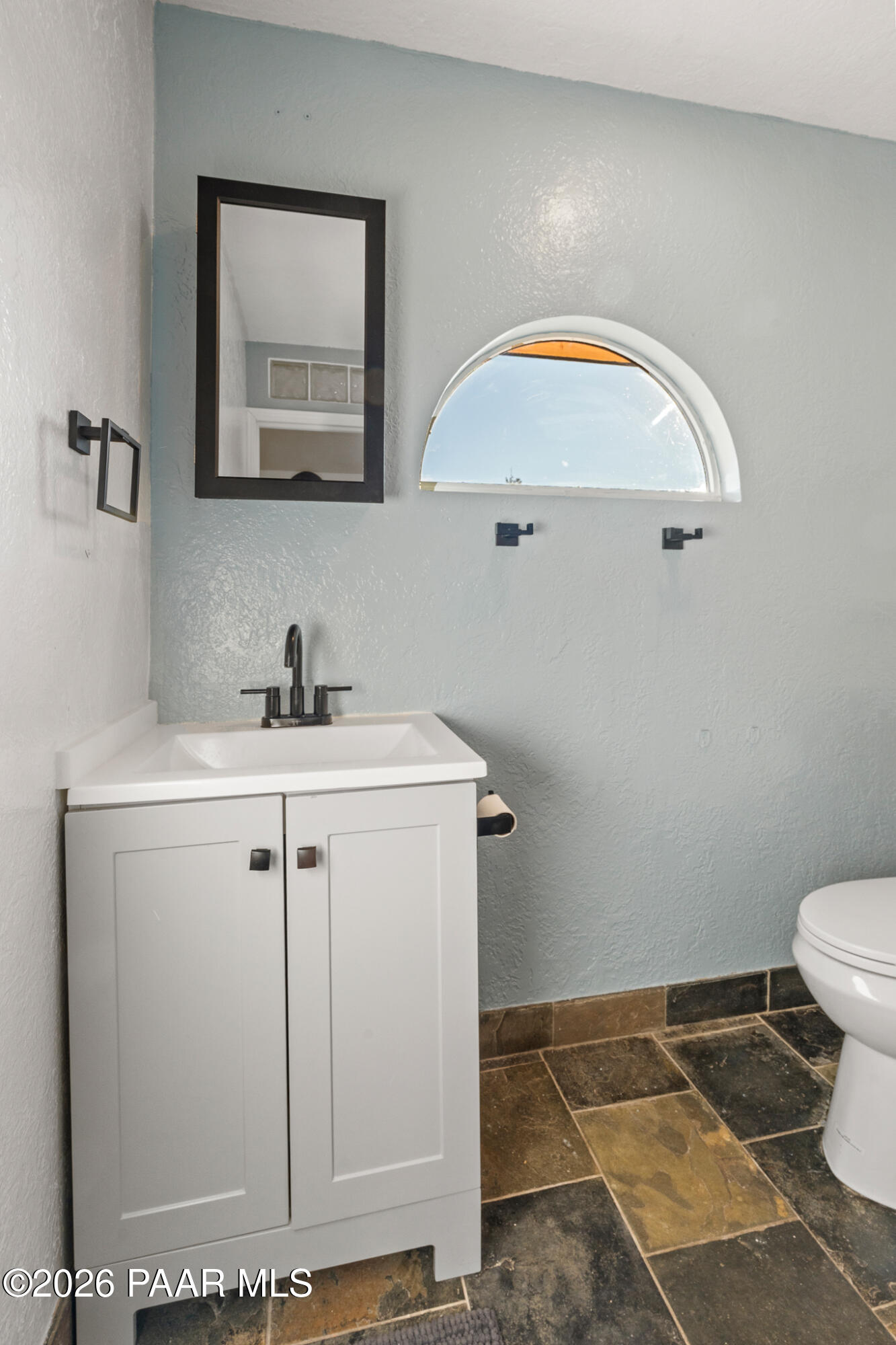 685 West Iris Road Paulden, AZ 86334 - Photo 11 of 33 a bathroom with a sink and a mirror