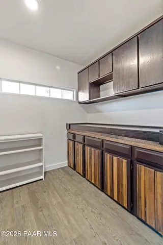 a view of an empty room with a balcony