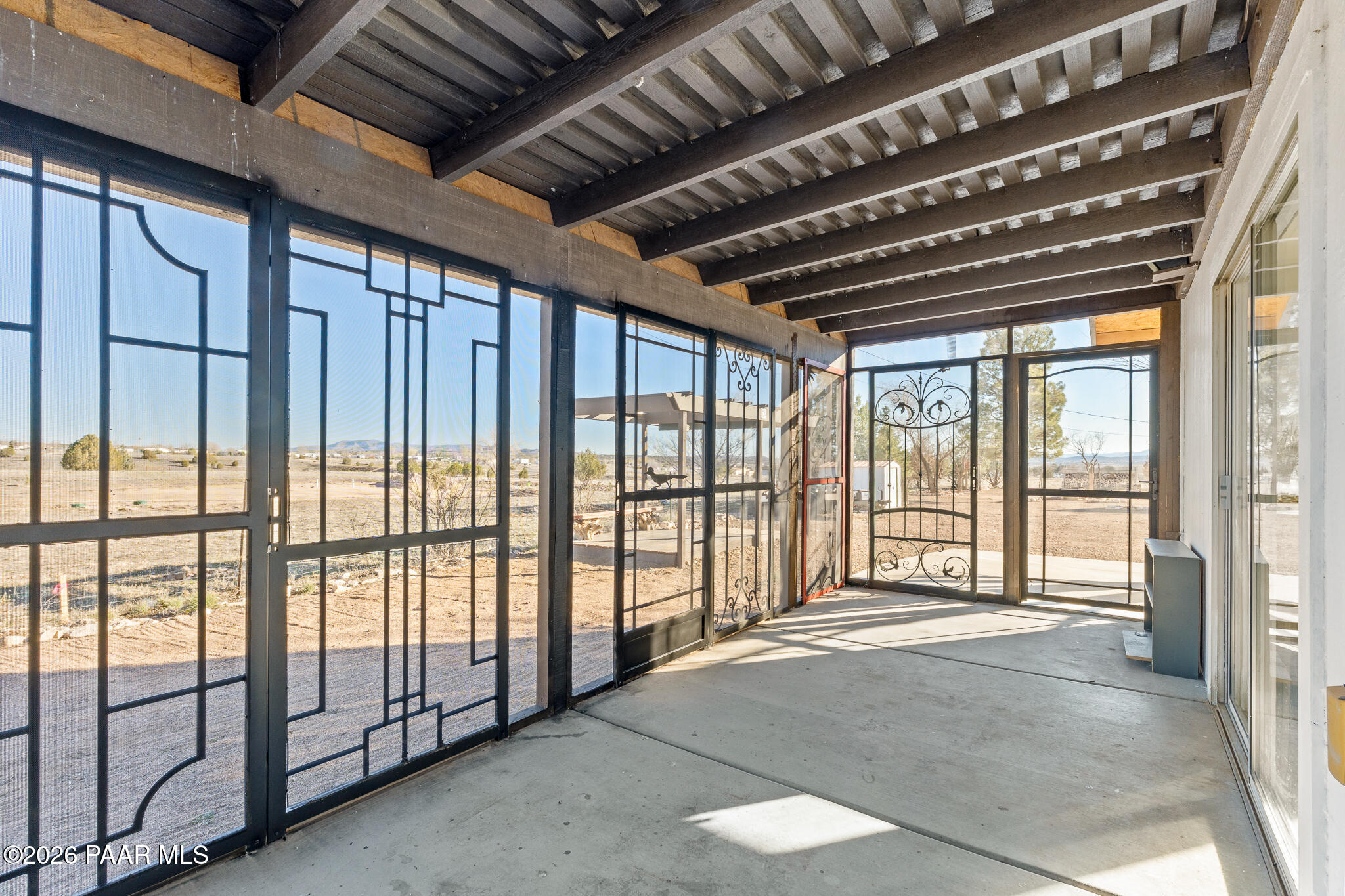 685 West Iris Road Paulden, AZ 86334 - Photo 14 of 33 a view of an empty room with a balcony